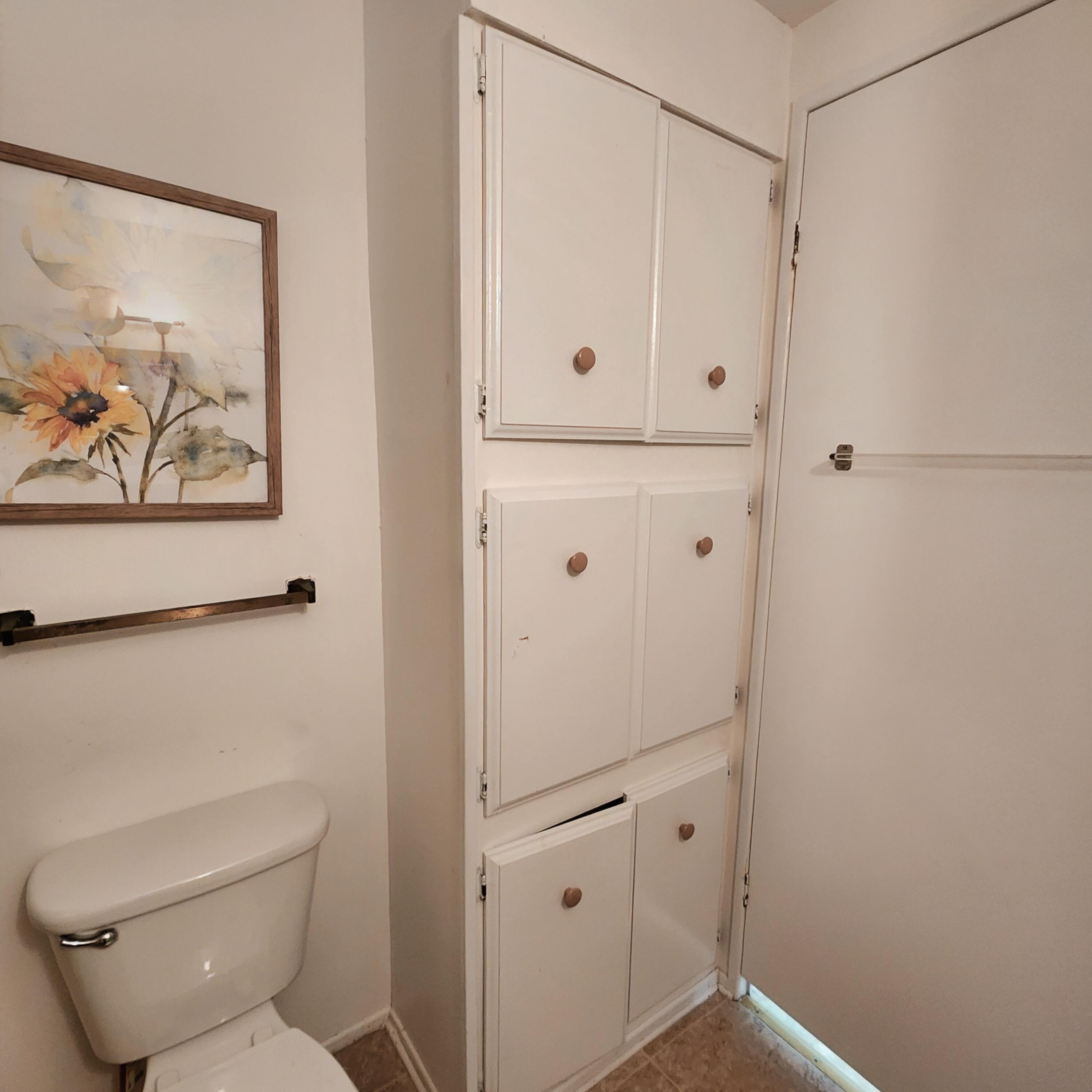 98 Camino Del Rio Port St. Lucie, FL 34952 - Photo 30 of 60 a bathroom with a shower and a toilet