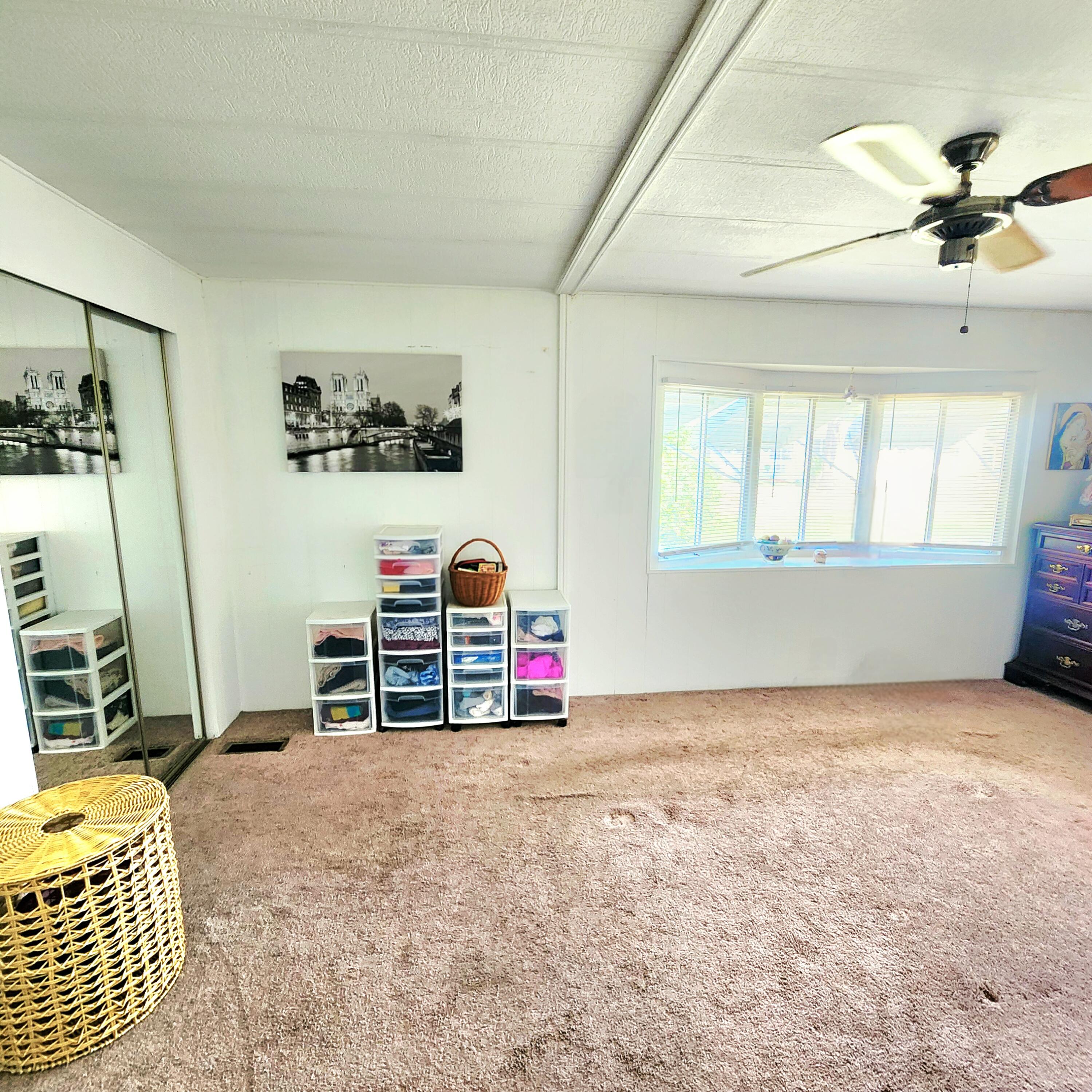 98 Camino Del Rio Port St. Lucie, FL 34952 - Photo 31 of 60 a view of livingroom with furniture and windows