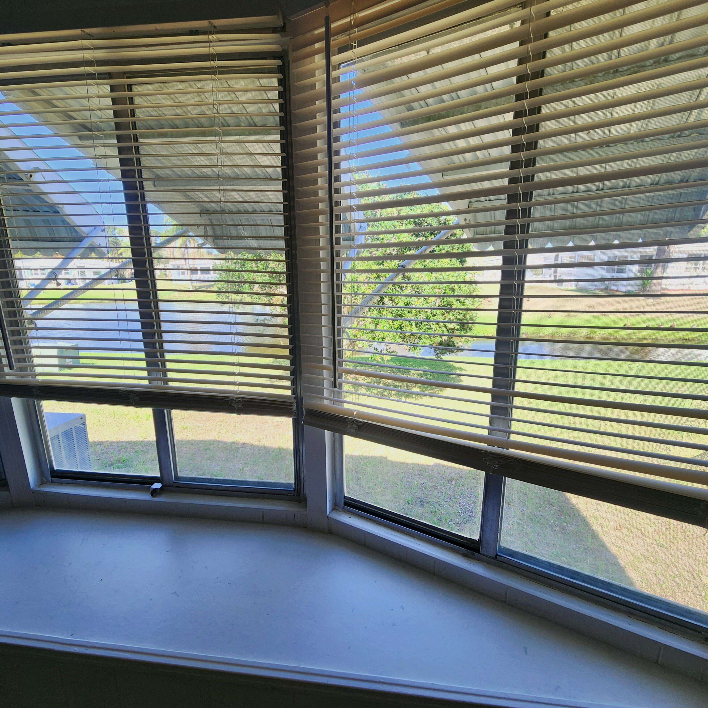 98 Camino Del Rio Port St. Lucie, FL 34952 - Photo 34 of 60 a view of a balcony with a bench