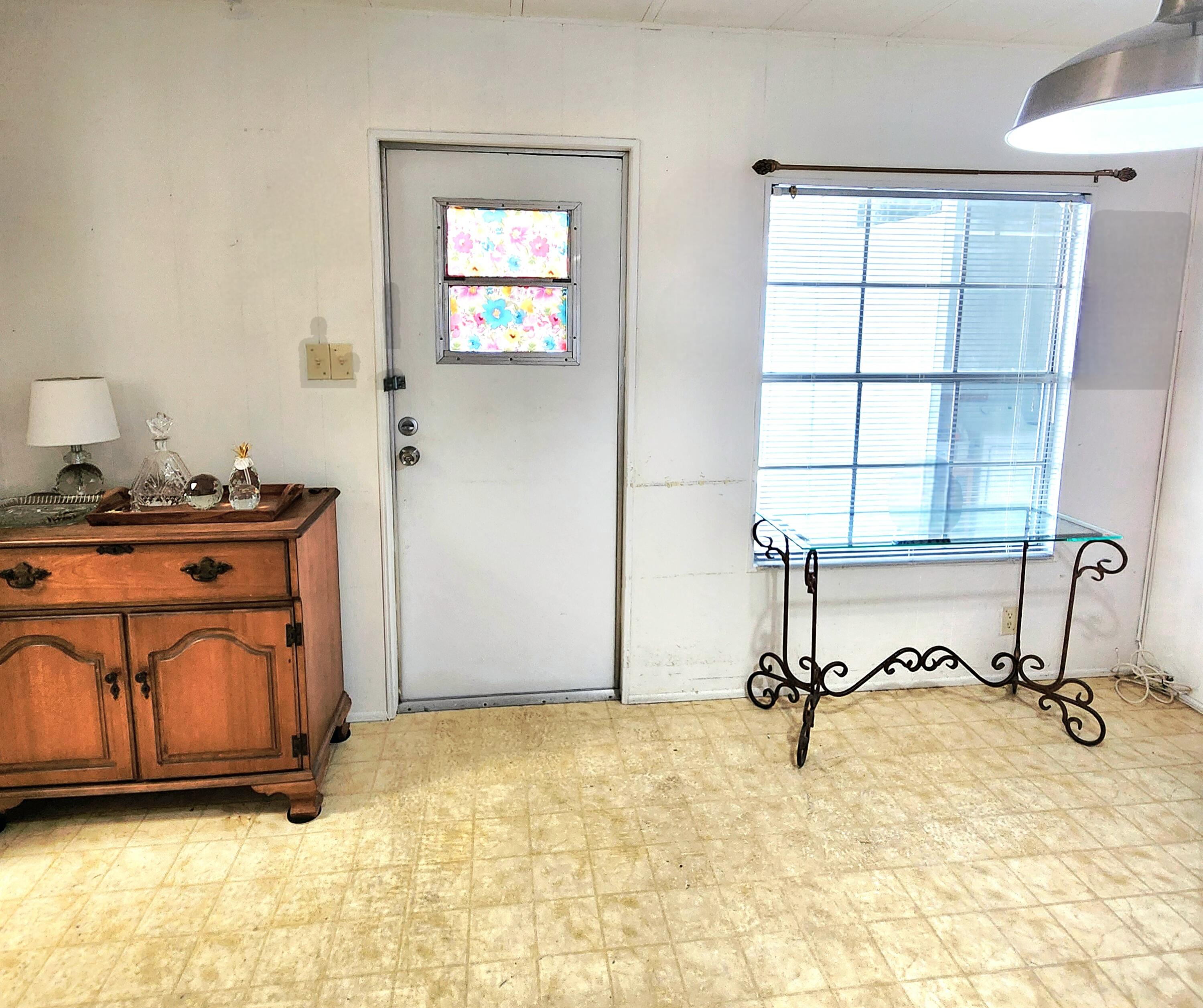 98 Camino Del Rio Port St. Lucie, FL 34952 - Photo 37 of 60 a view of a workspace with furniture