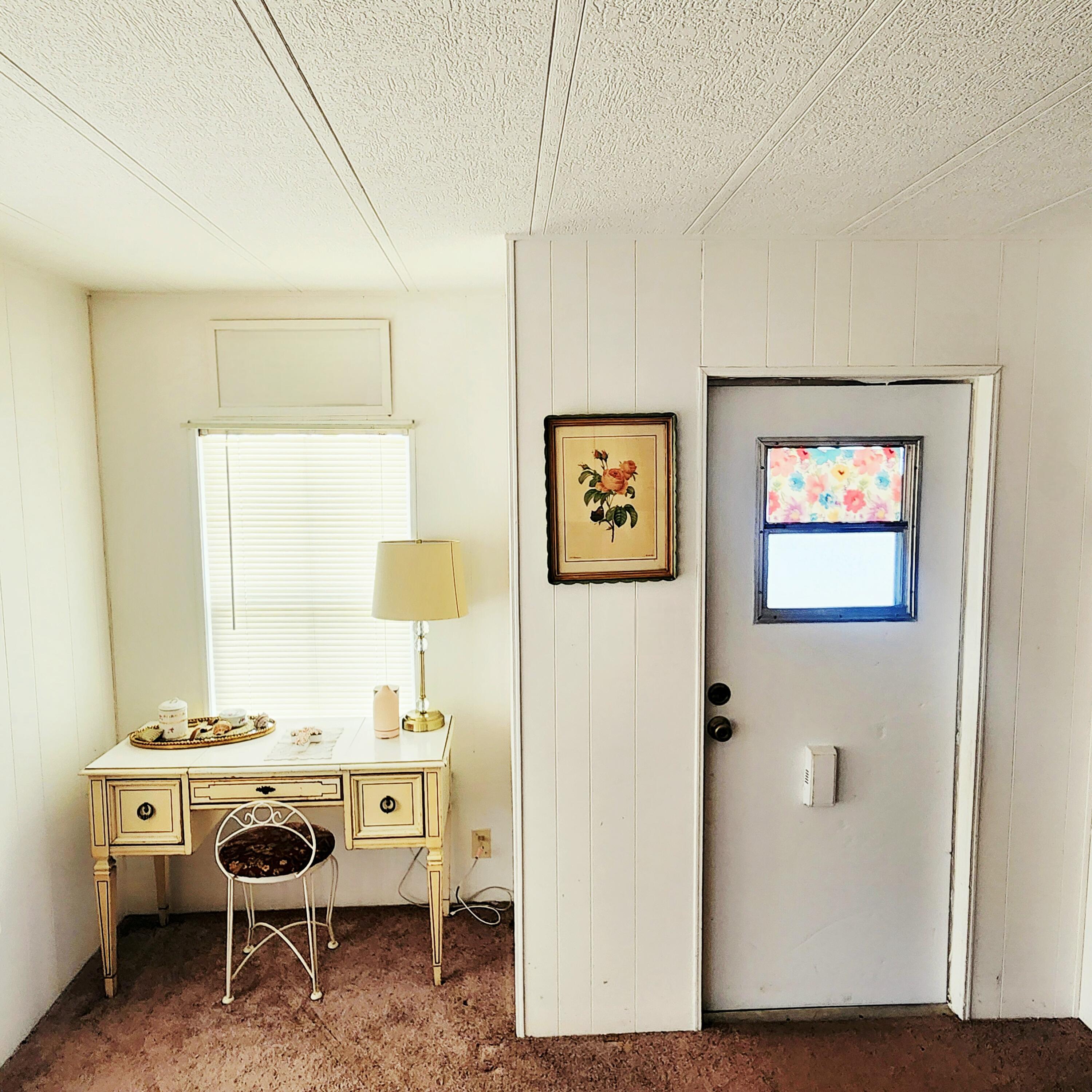 98 Camino Del Rio Port St. Lucie, FL 34952 - Photo 7 of 60 a view of a bathroom with dual sinks