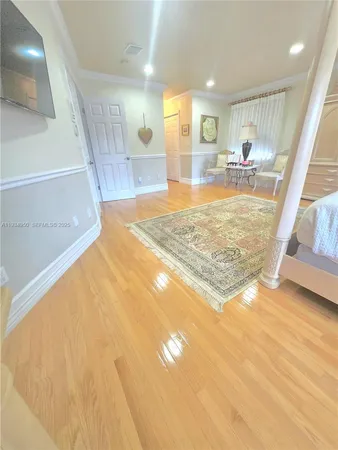 a bathroom with a tub shower and sink