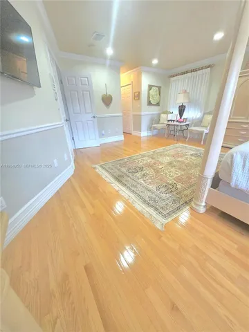 a bathroom with a tub shower and sink