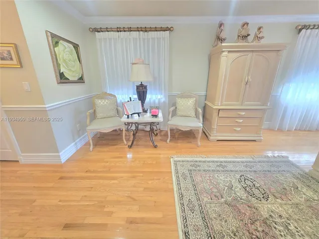 a bathroom with a tub shower and sink