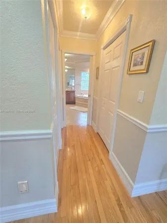 a bathroom with a toilet and a mirror
