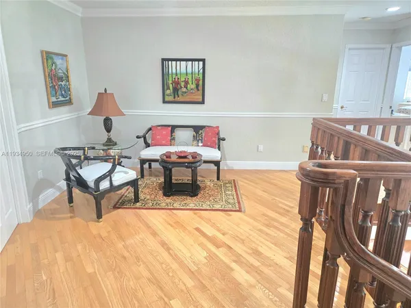 a view of a swimming pool with a yard