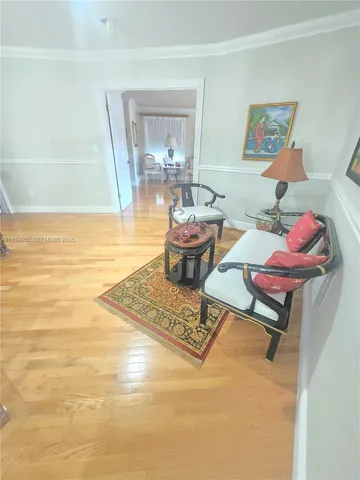 a view of a swimming pool with an outdoor seating