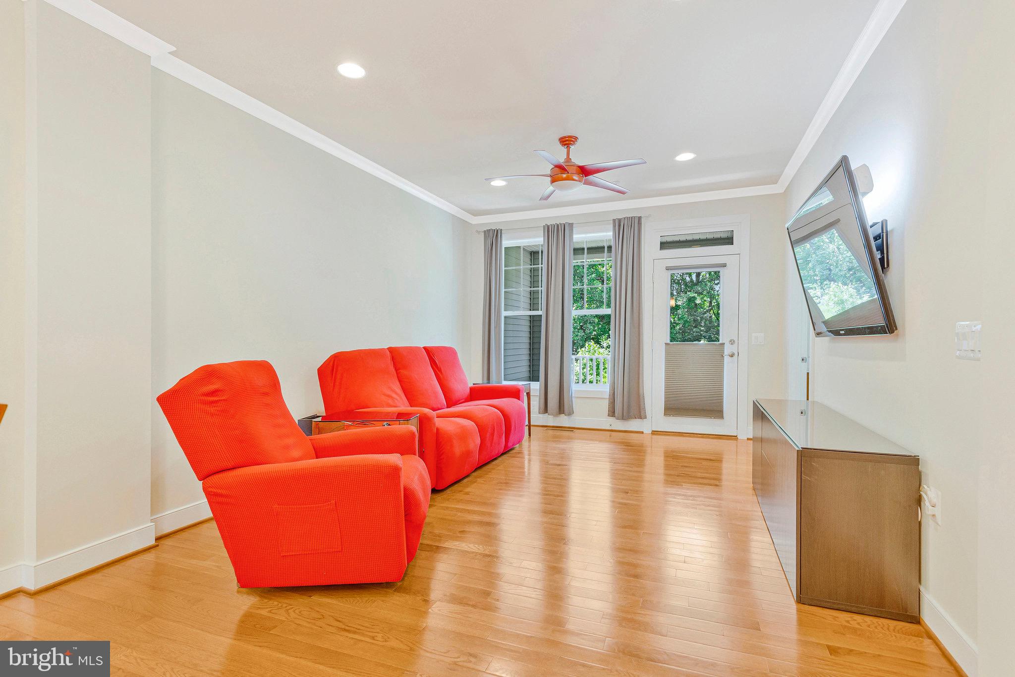 9726 Knowledge Drive Laurel, MD 20723 - Photo 11 of 54 a living room with furniture and a large window