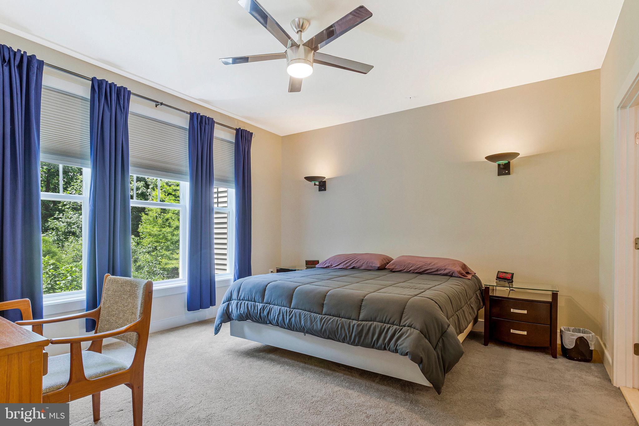 9726 Knowledge Drive Laurel, MD 20723 - Photo 15 of 54 a bedroom with a bed and a window