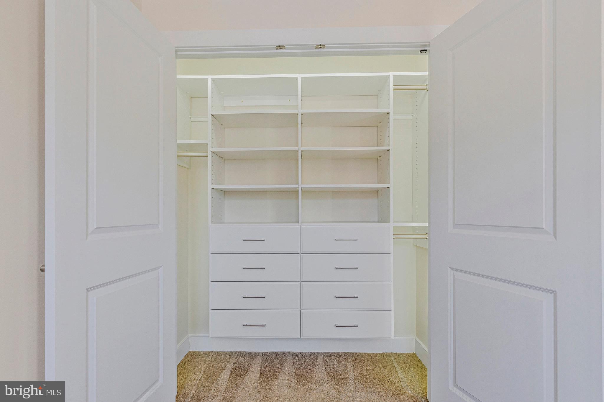 9726 Knowledge Drive Laurel, MD 20723 - Photo 44 of 54 a view of walk in closet