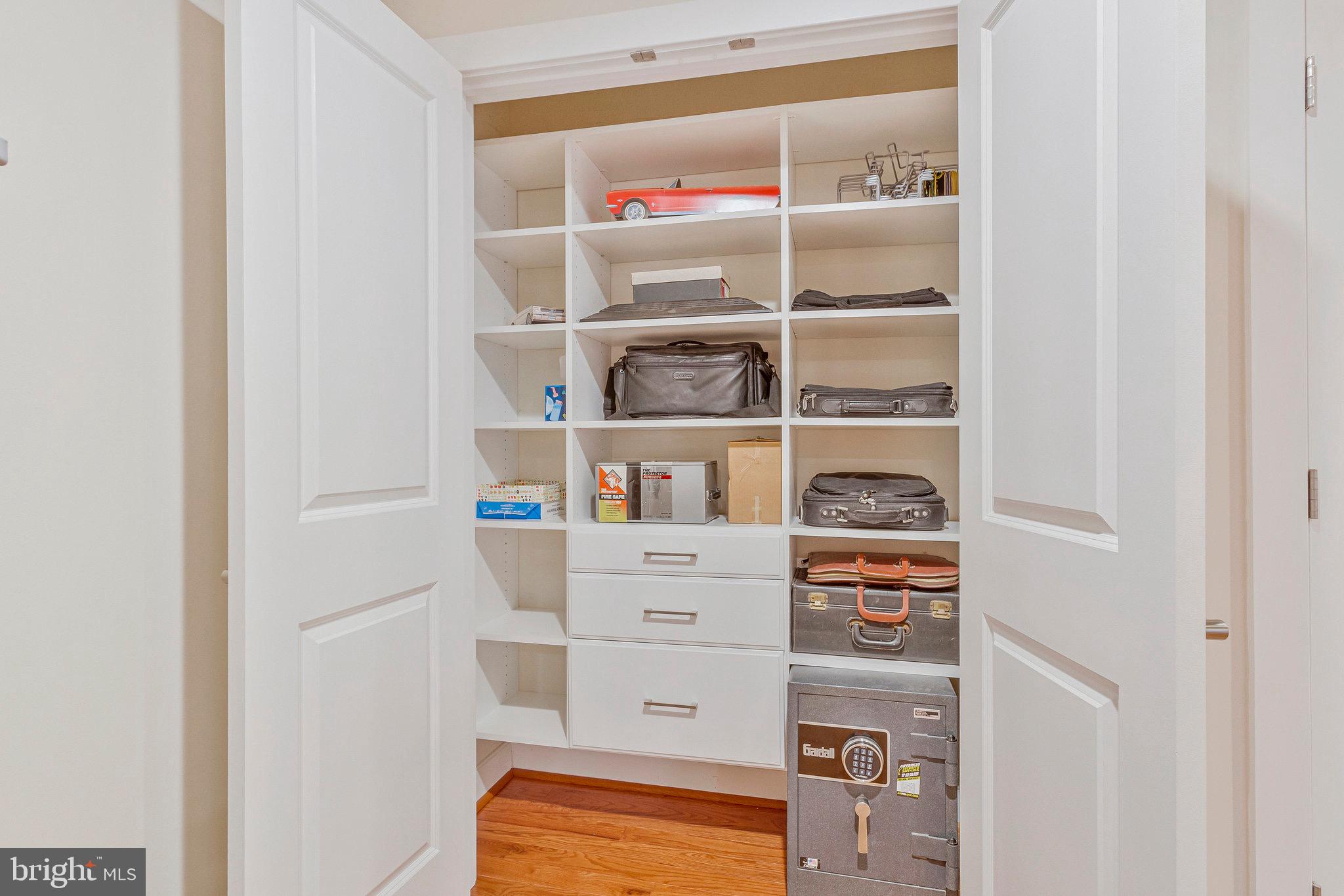 9726 Knowledge Drive Laurel, MD 20723 - Photo 46 of 54 a view of walk in closet with empty racks