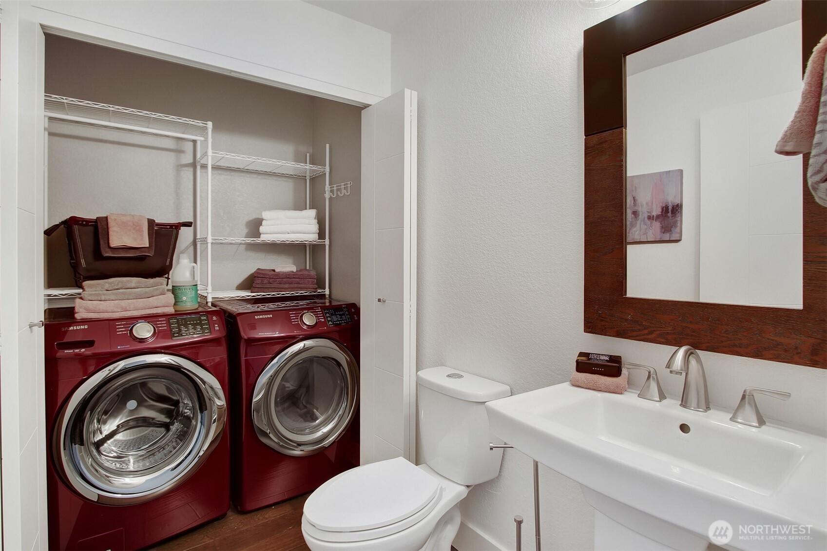 1230 222nd Place Southwest Bothell, WA 98021 - Photo 15 of 28 a bathroom with a sink a washer and dryer