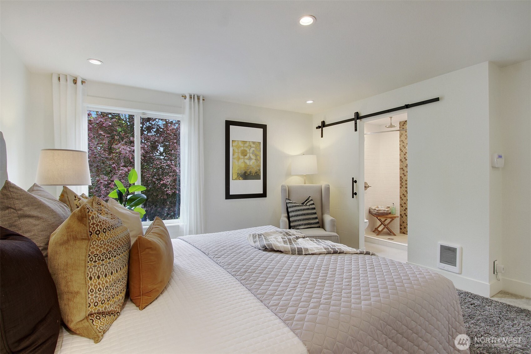 1230 222nd Place Southwest Bothell, WA 98021 - Photo 17 of 28 a bedroom with a large bed and a window