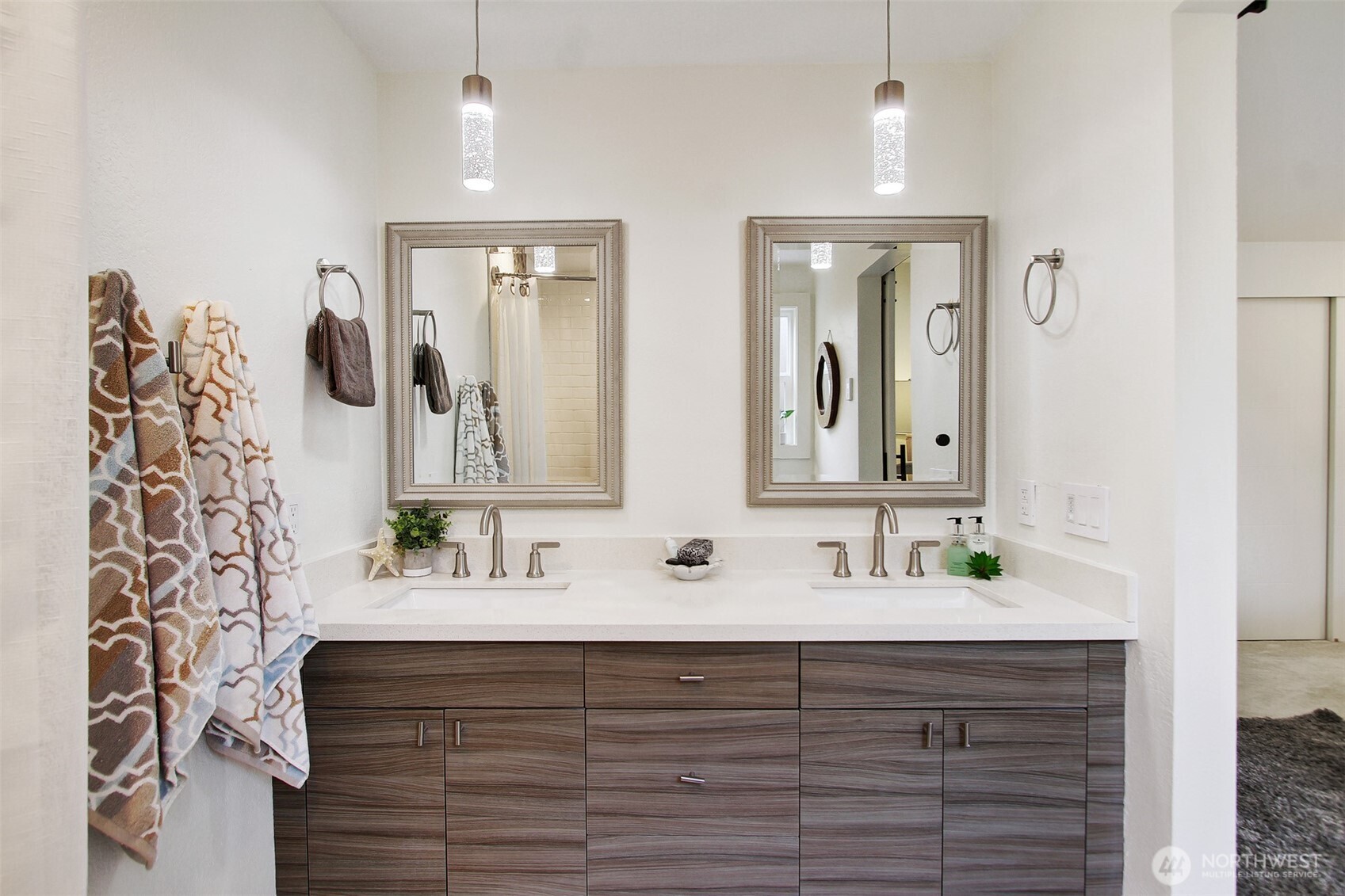 1230 222nd Place Southwest Bothell, WA 98021 - Photo 20 of 28 a bathroom with double vanity sink and two mirror