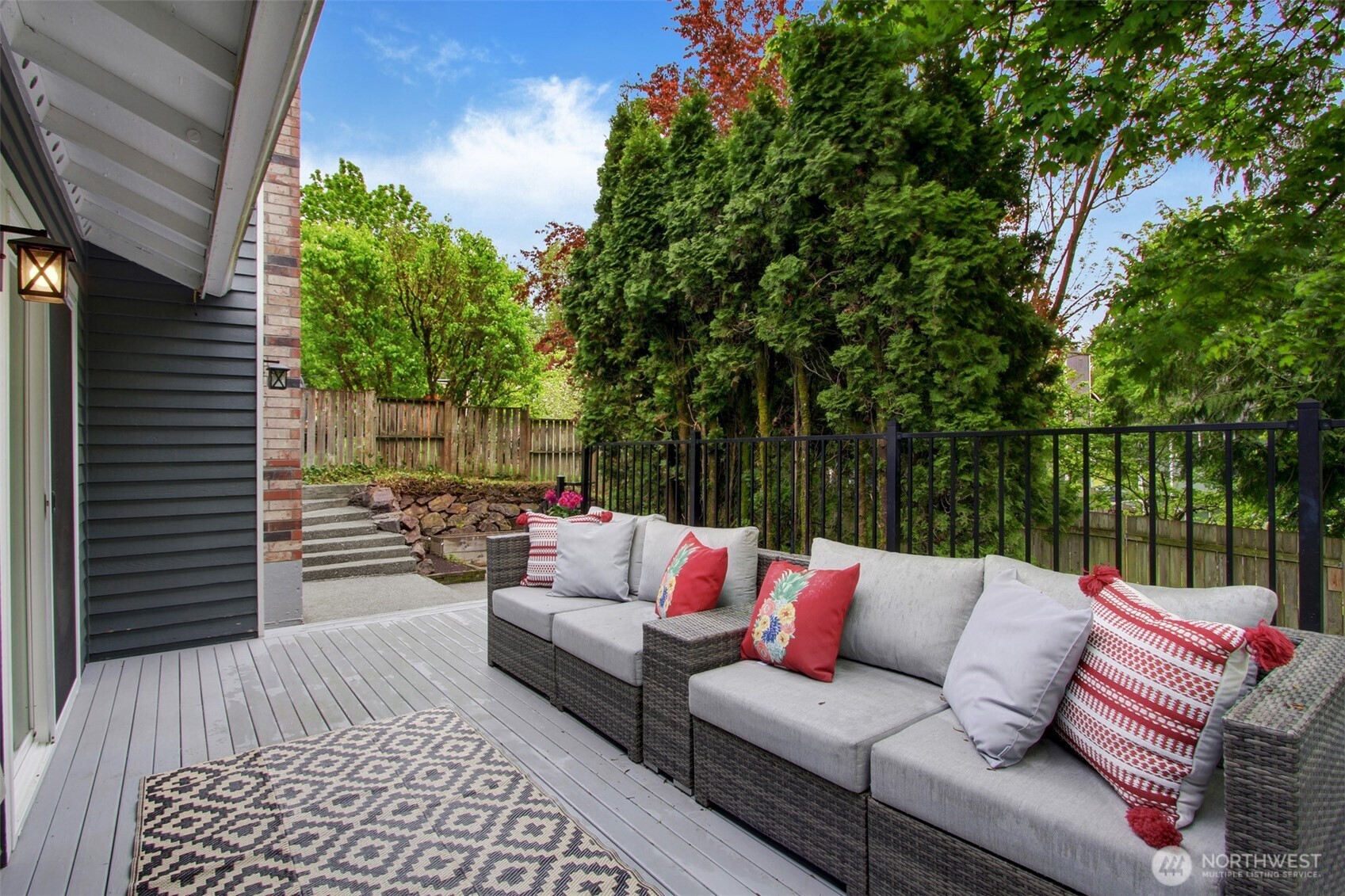 1230 222nd Place Southwest Bothell, WA 98021 - Photo 26 of 28 a roof deck with couches and potted plants