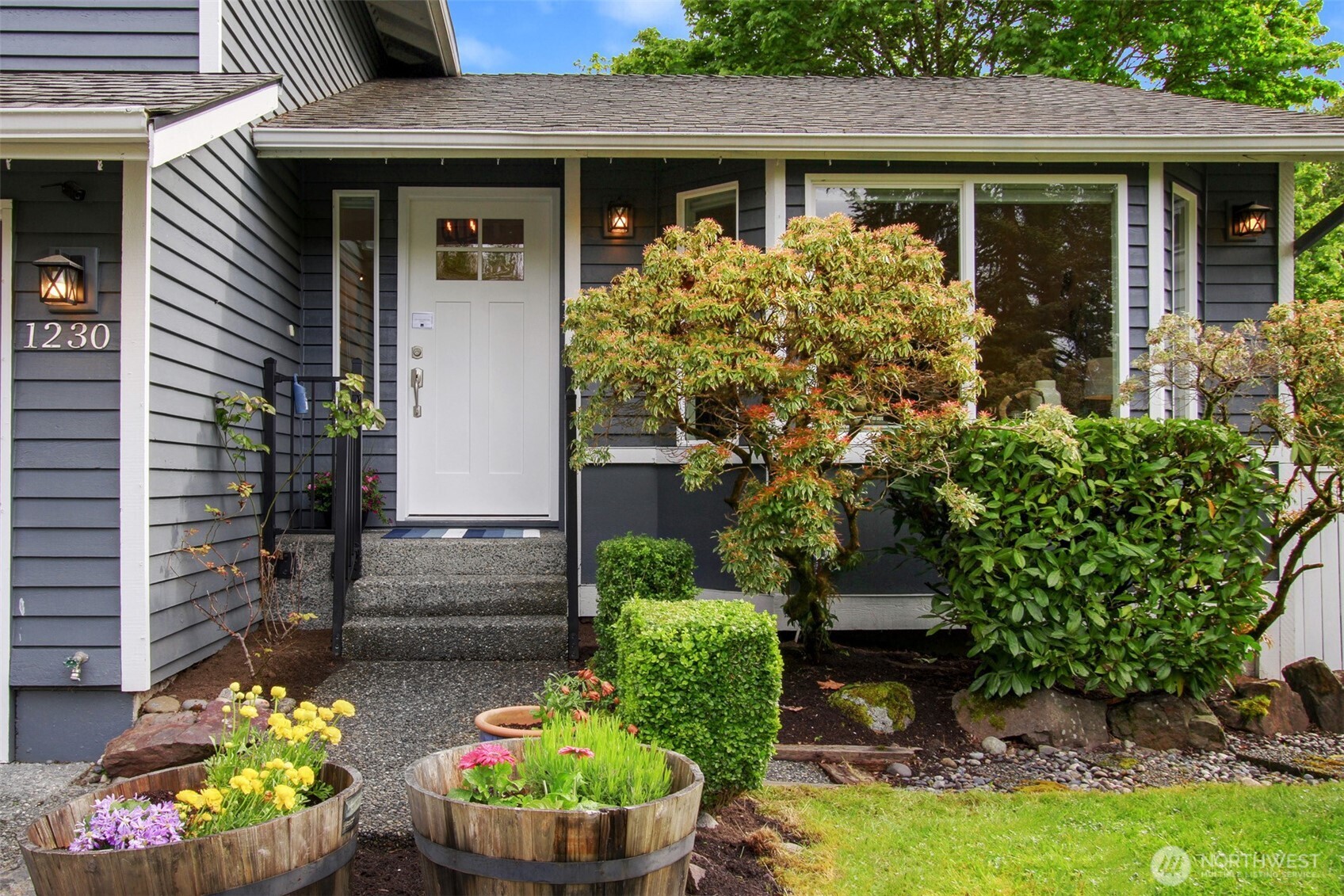 1230 222nd Place Southwest Bothell, WA 98021 - Photo 28 of 28 a front view of a house
