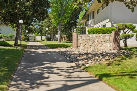 a view of a street with a house