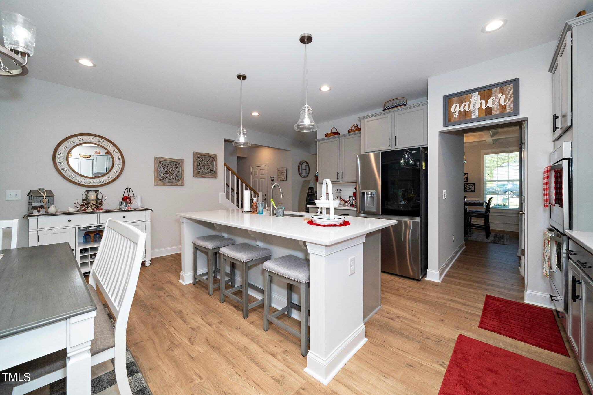 204 Stephens Timberline View Clayton, NC 27520 - Photo 11 of 43 a kitchen with a table and chairs