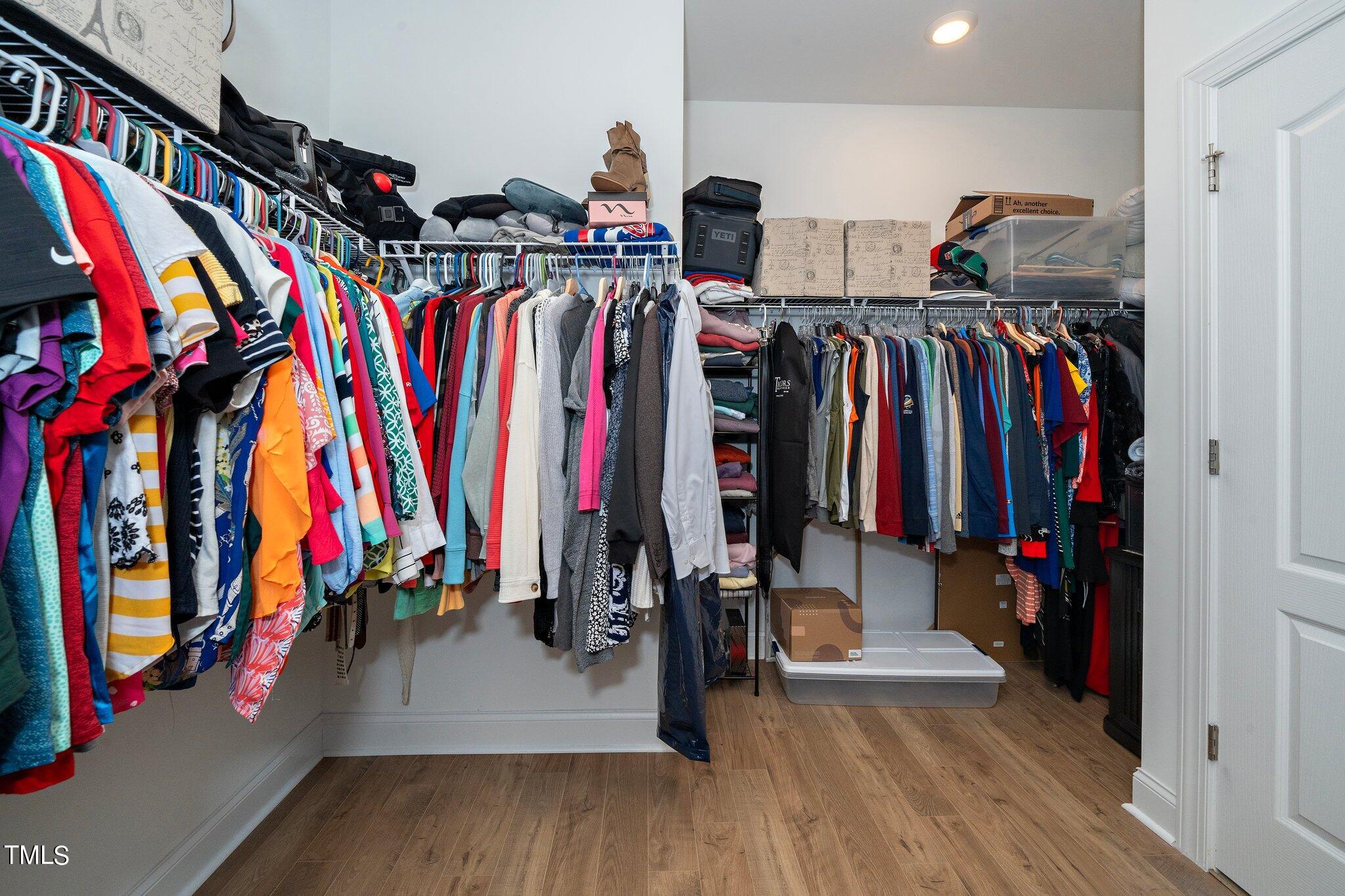 204 Stephens Timberline View Clayton, NC 27520 - Photo 21 of 43 a view of walk in closet with clothes