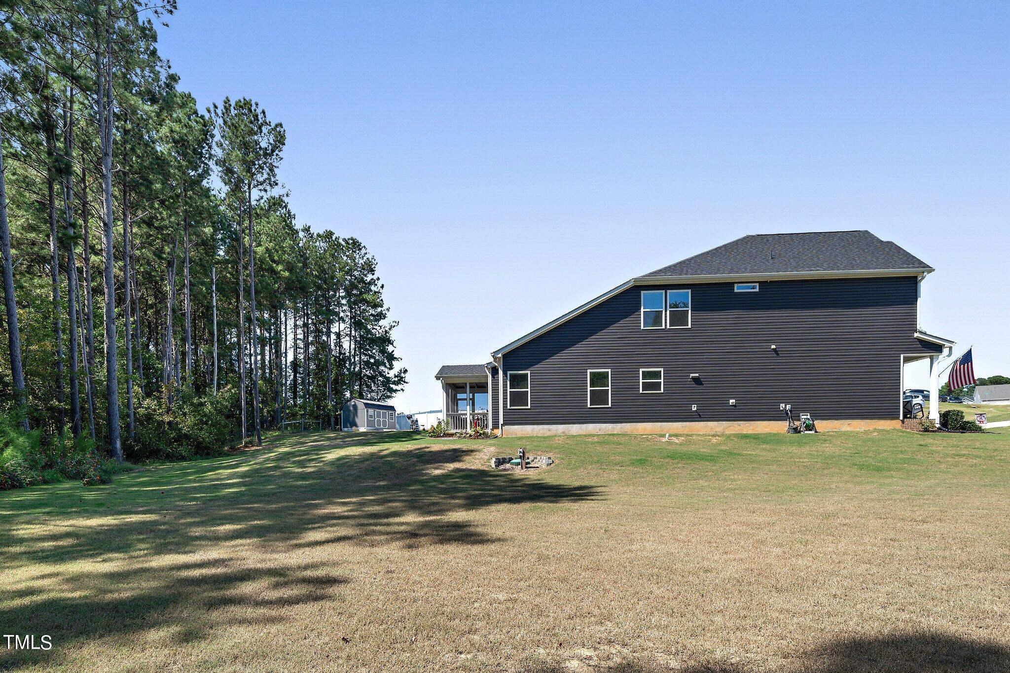 204 Stephens Timberline View Clayton, NC 27520 - Photo 35 of 43 a view of a house with a big yard