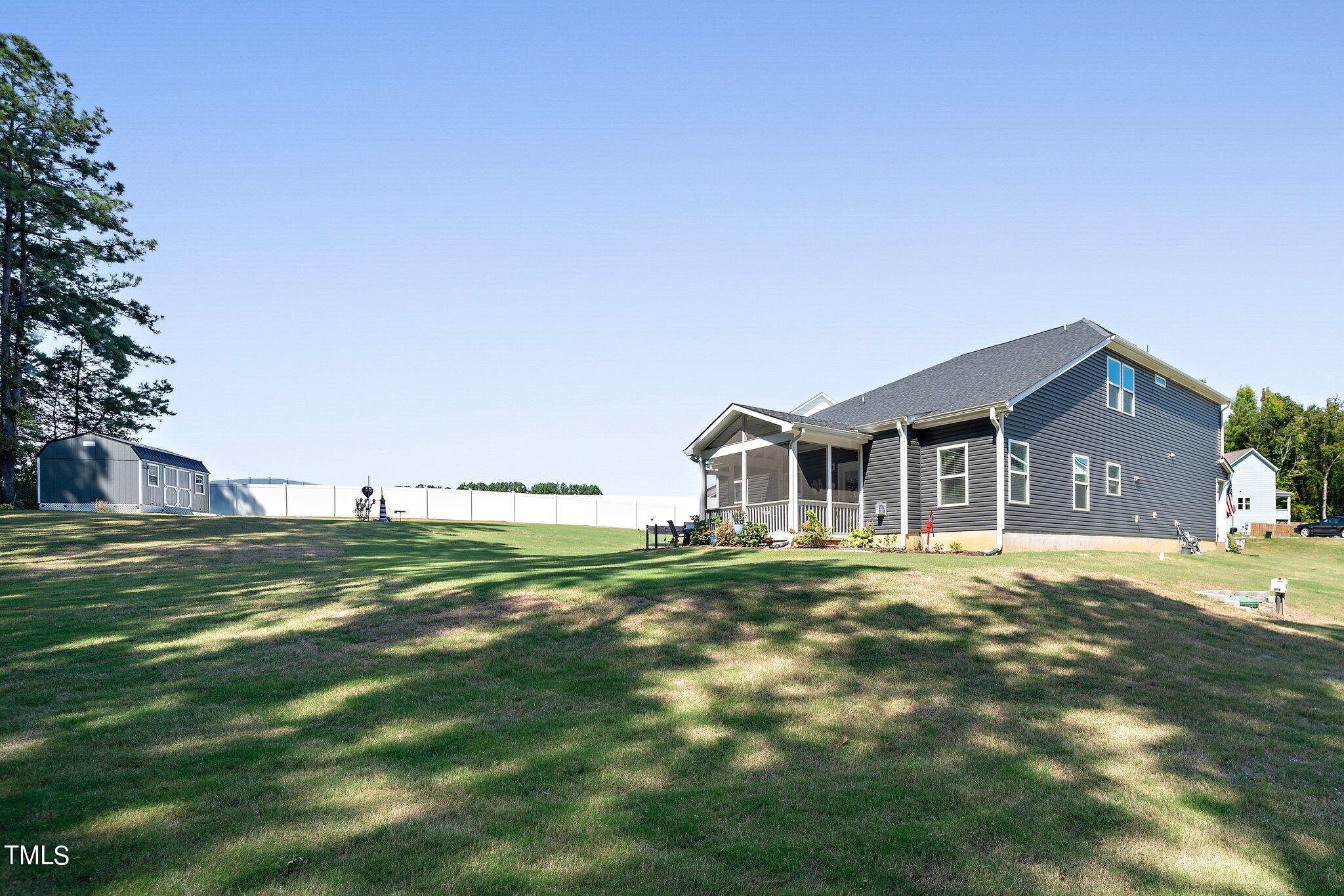 204 Stephens Timberline View Clayton, NC 27520 - Photo 36 of 43 a front view of a house with a big yard