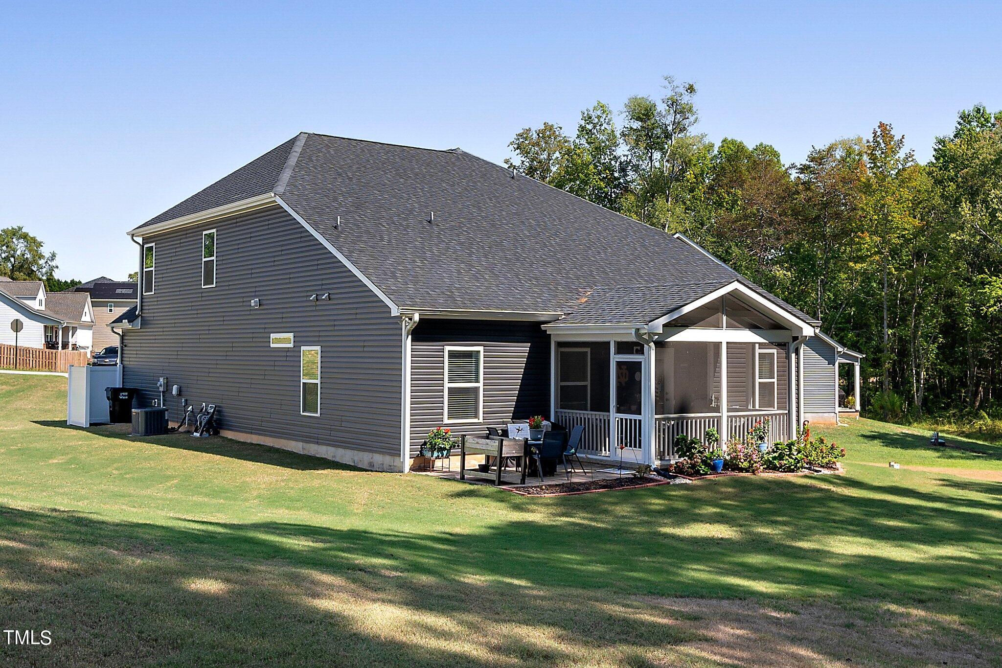 204 Stephens Timberline View Clayton, NC 27520 - Photo 38 of 43 a front view of house with yard and green space