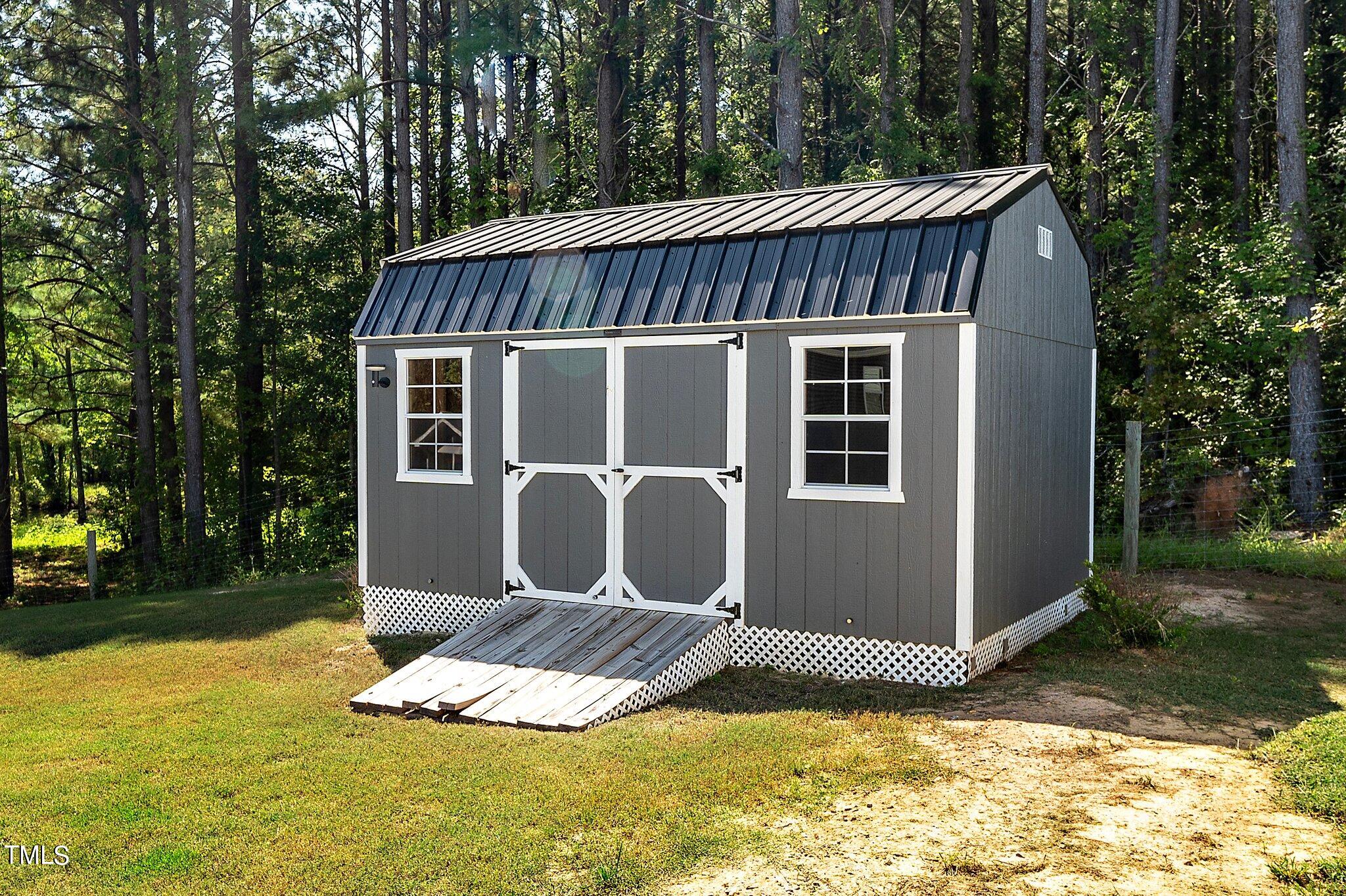 204 Stephens Timberline View Clayton, NC 27520 - Photo 40 of 43 a view of a house with backyard