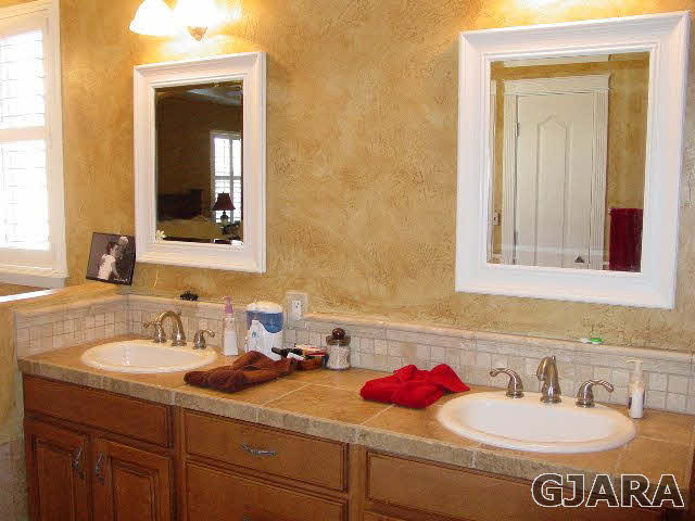 2502 Riata Ranch Road Grand Junction, CO 81505 - Photo 13 of 31 a bathroom with a sink and a mirror