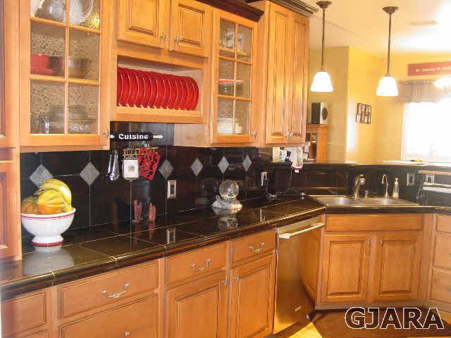 2502 Riata Ranch Road Grand Junction, CO 81505 - Photo 6 of 31 a kitchen with granite countertop a sink and a window