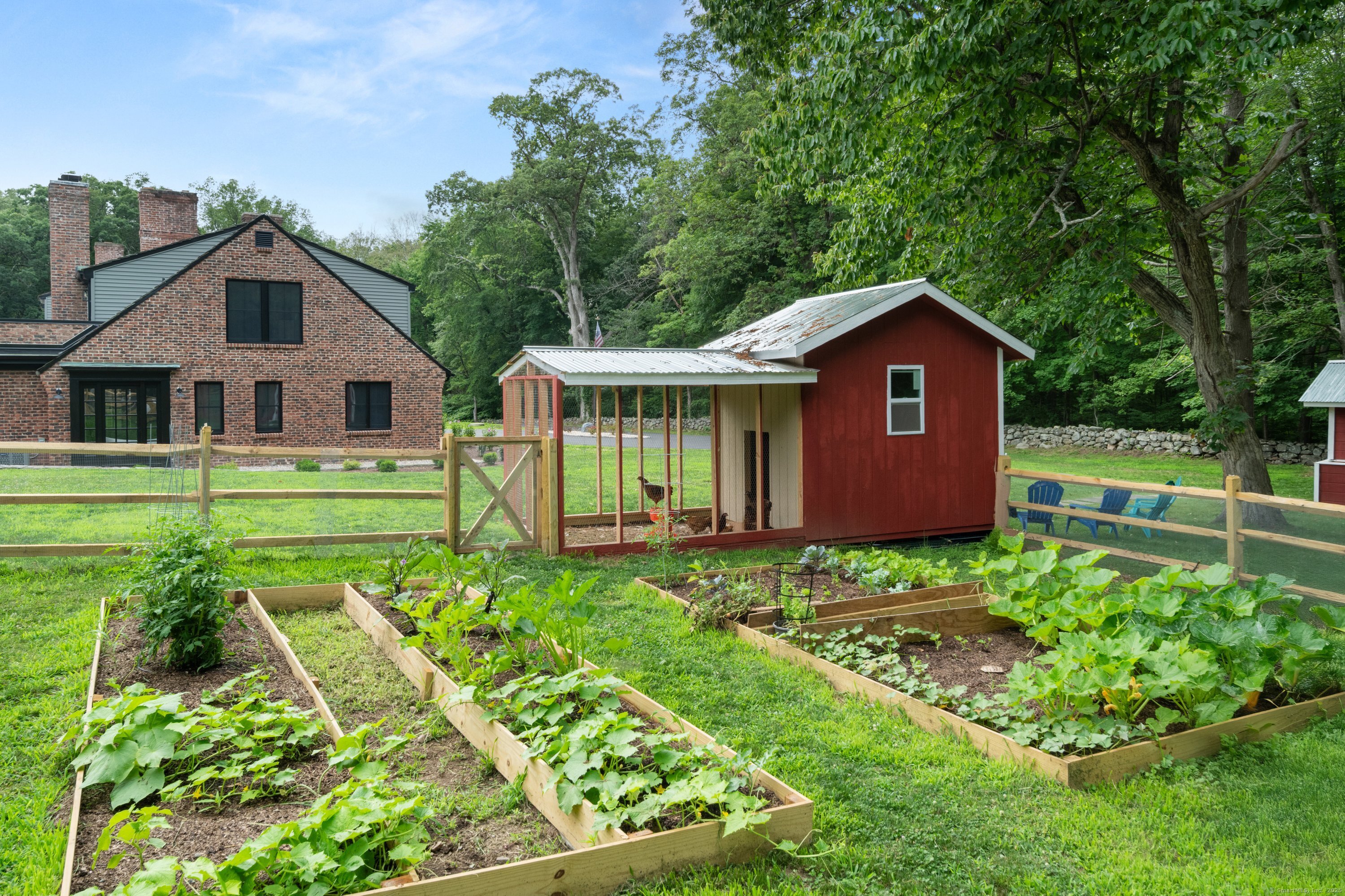 372 Tucker Hill Road Middlebury, CT 06762 - Photo 12 of 33 front view of a house with a yard