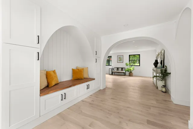 a view of living room with furniture and flat screen tv