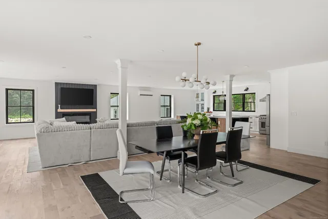 a view of a livingroom with furniture and window