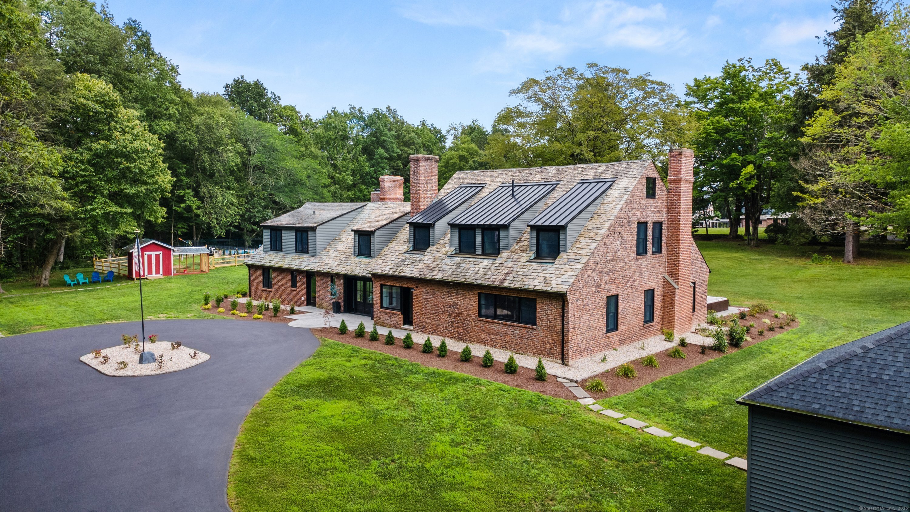 372 Tucker Hill Road Middlebury, CT 06762 - Photo 3 of 33 a view of a house with a yard porch and sitting area