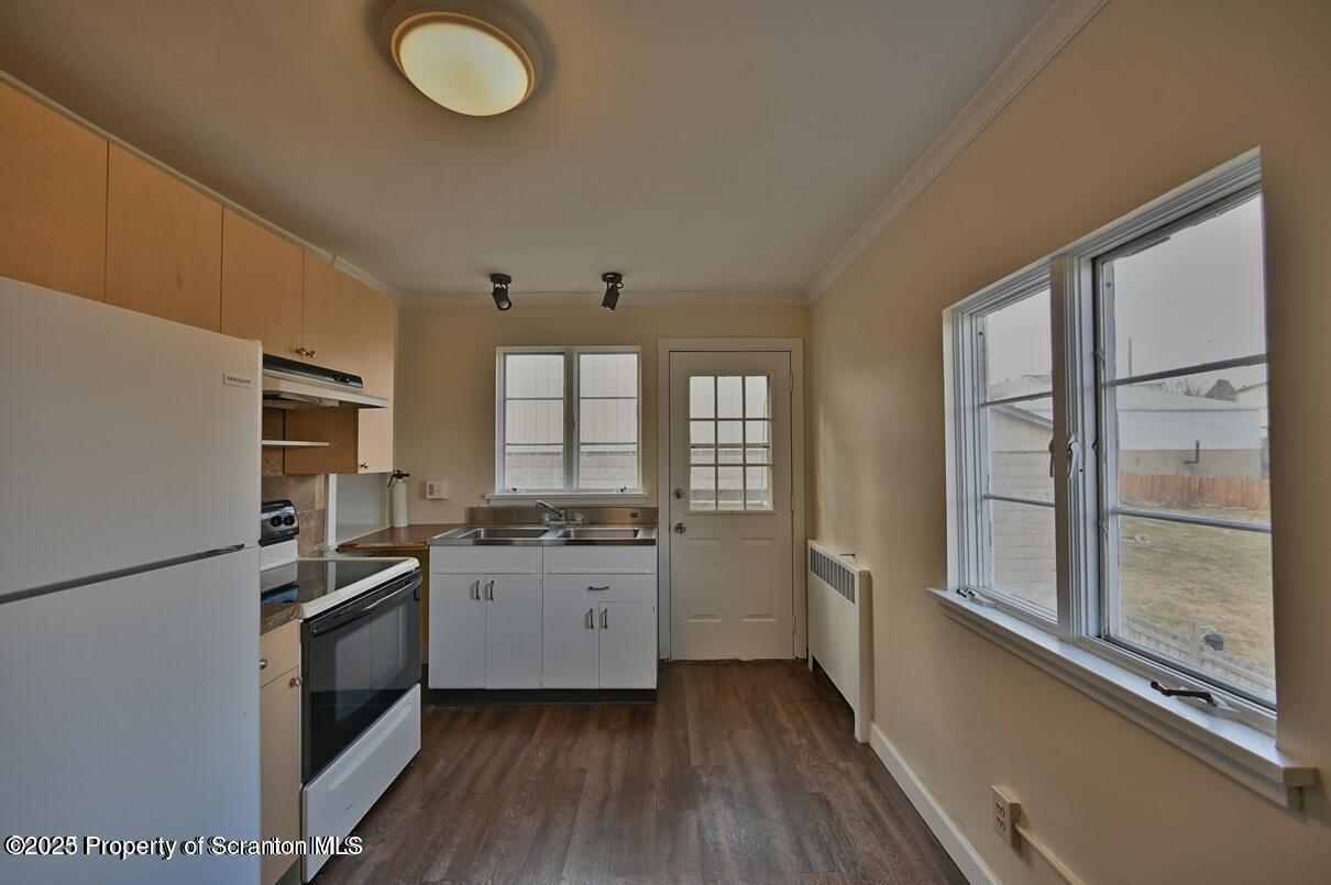 1025 Ridge Avenue Scranton, PA 18510 - Photo 10 of 49 a kitchen with stainless steel appliances granite countertop a stove a sink and a refrigerator