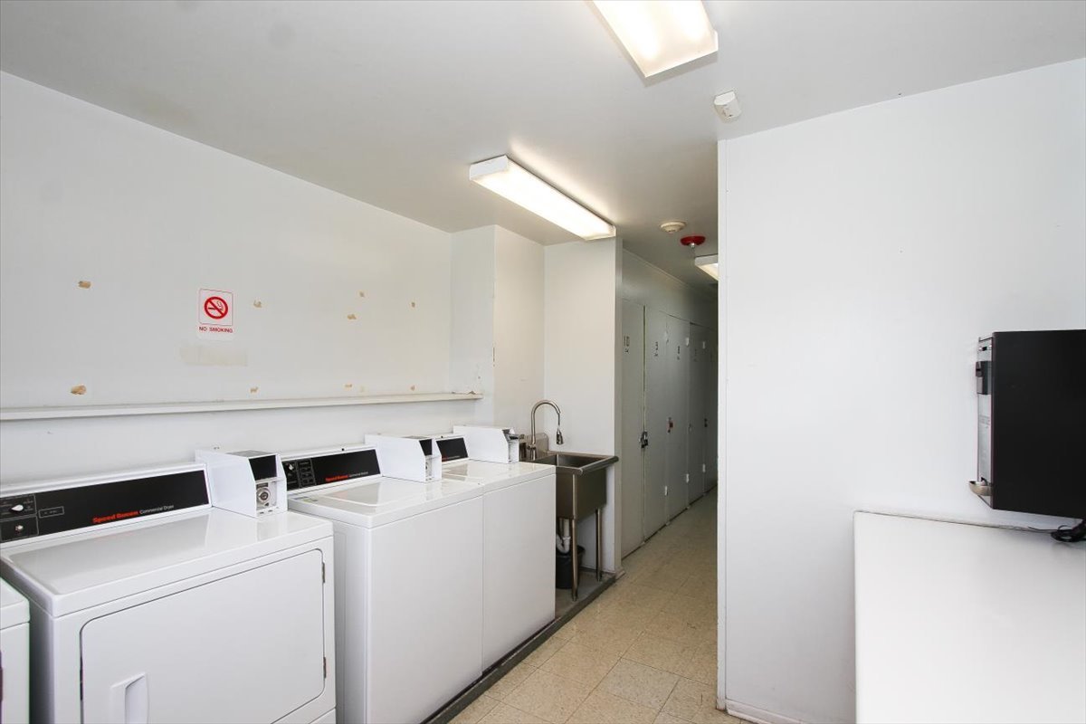2300 Old Tavern Road, Unit 203 Lisle, IL 60532 - Photo 21 of 26 a utility room with dryer and washer