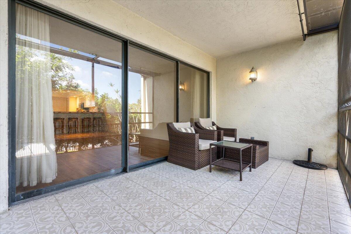 1811 Southwest Palm City Road, Unit A202 Stuart, FL 34994 - Photo 13 of 27 Screened Patio