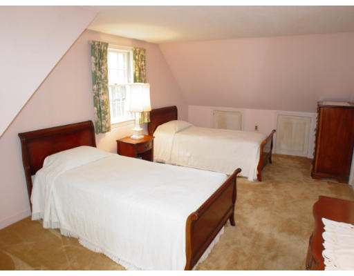 109 Pleasant Valley Road Amesbury, MA 01913 - Photo 6 of 8 a bedroom with two beds and a dresser
