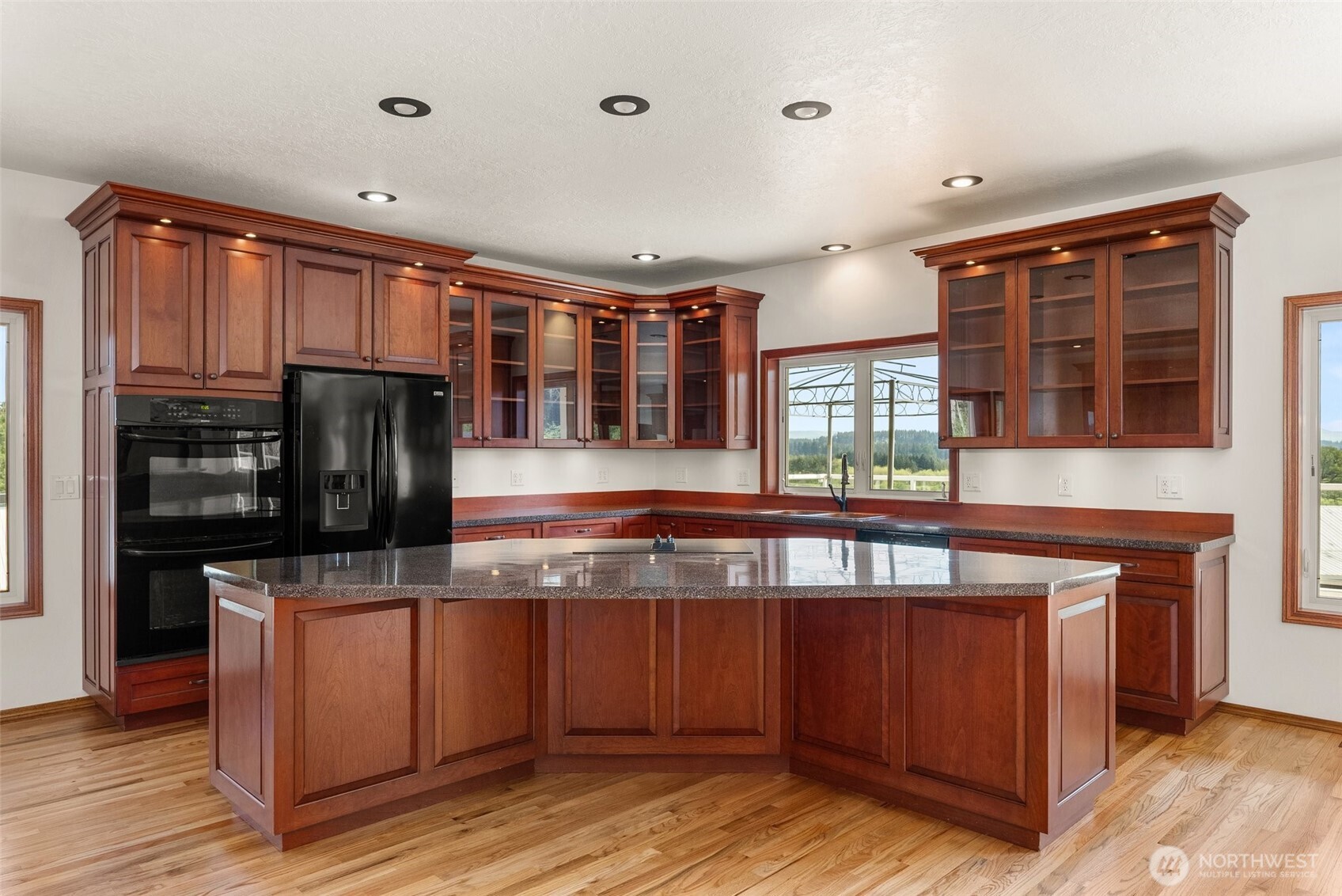 139 Coulson Road Chehalis, WA 98532 - Photo 14 of 40 a kitchen with stainless steel appliances granite countertop a stove and a refrigerator