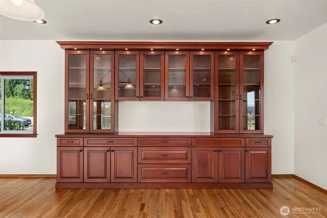 a kitchen with stainless steel appliances granite countertop a stove and a refrigerator