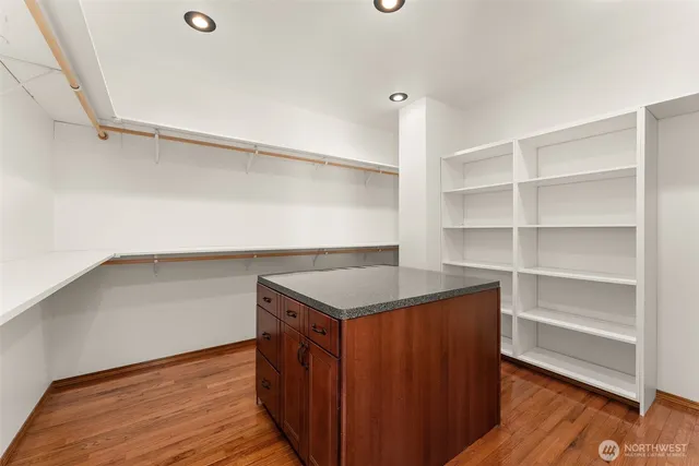 a bathroom with a tub and a sink