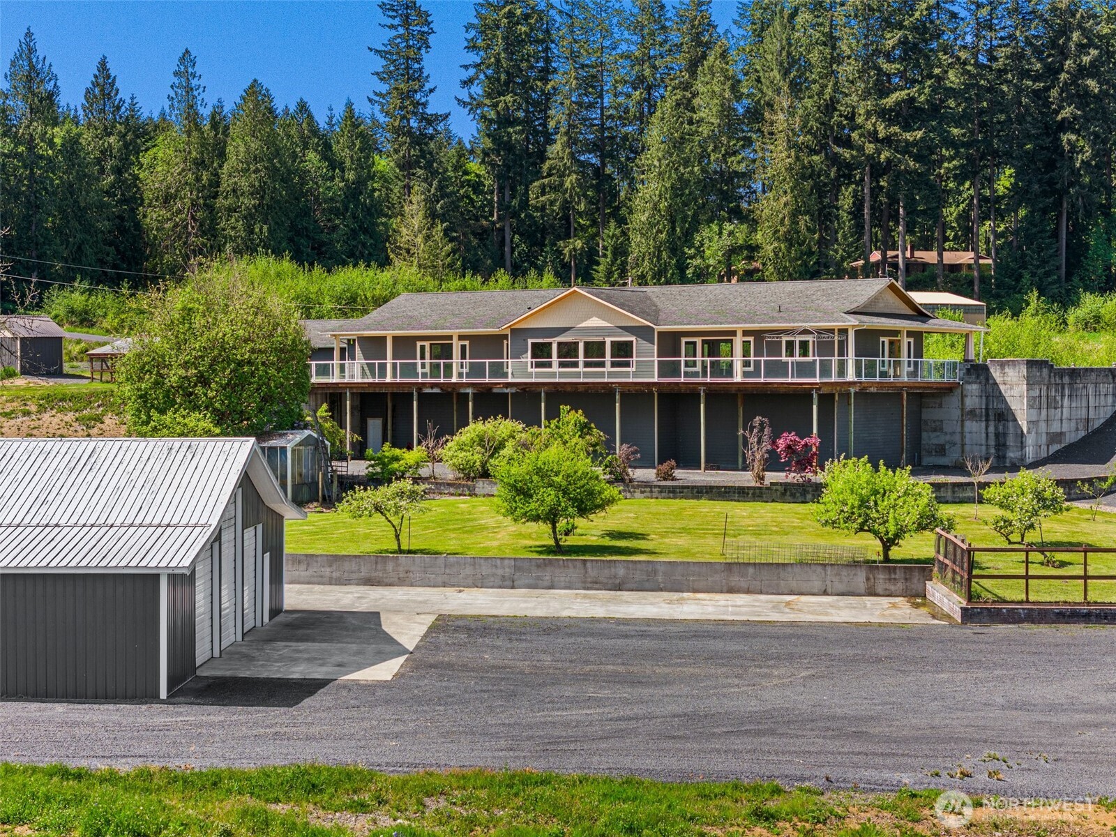 139 Coulson Road Chehalis, WA 98532 - Photo 38 of 40 a front view of a house with a yard table and chairs