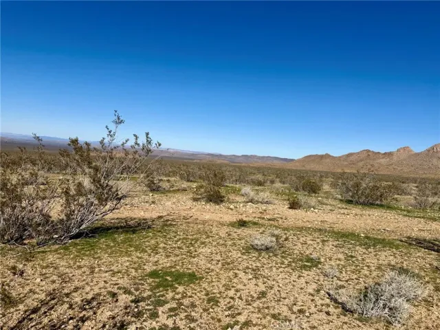 a view of lake with mountain