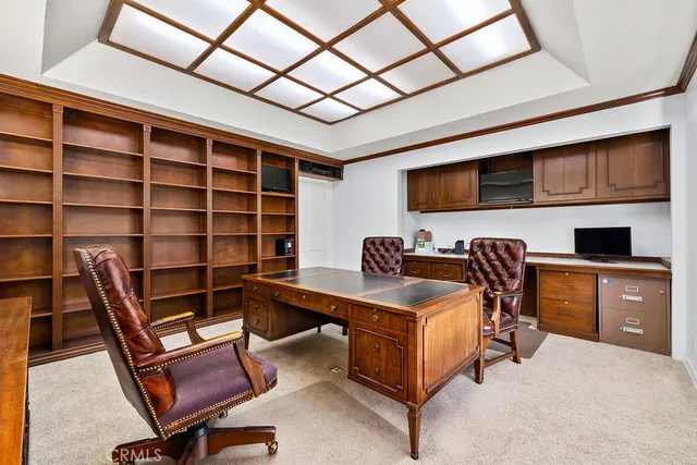 a view of a workspace with furniture