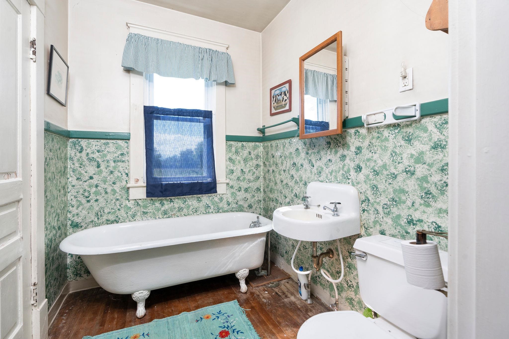 159 Buttermilk Road Mount Sidney, VA 24467 - Photo 20 of 75 a bathroom with a sink mirror and a toilet