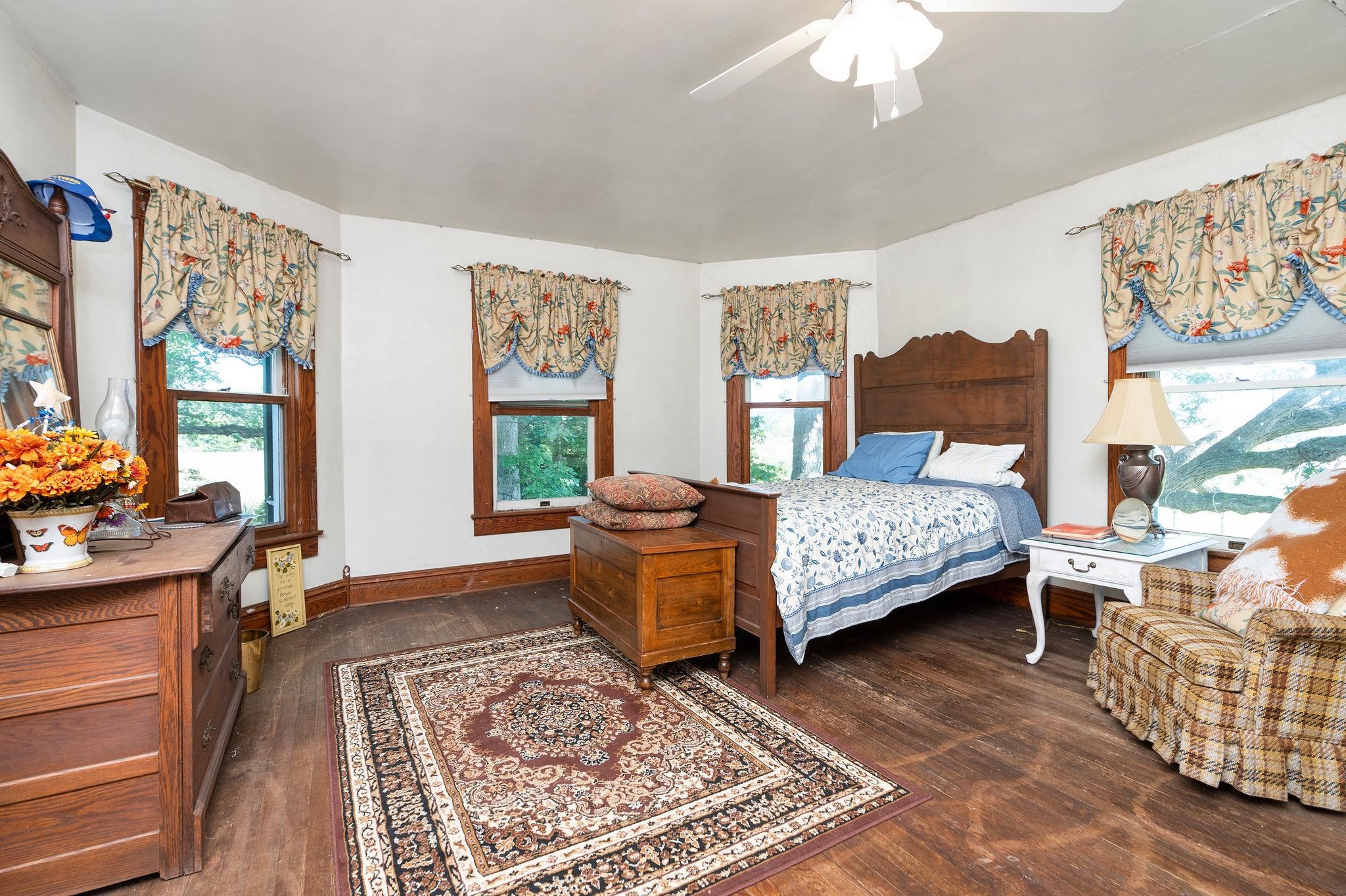 159 Buttermilk Road Mount Sidney, VA 24467 - Photo 35 of 75 a bedroom with a bed and wooden floor