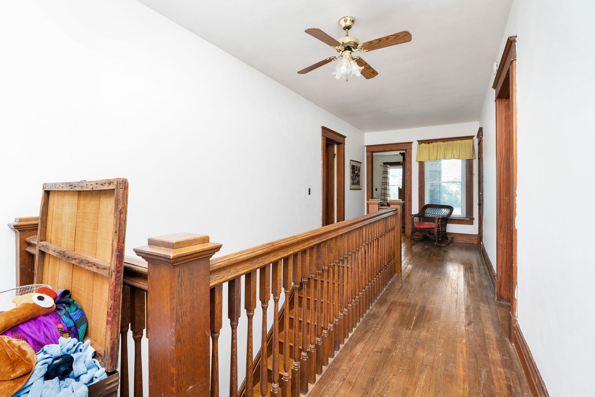 159 Buttermilk Road Mount Sidney, VA 24467 - Photo 36 of 75 a view of a hallway with wooden floor and a bathroom
