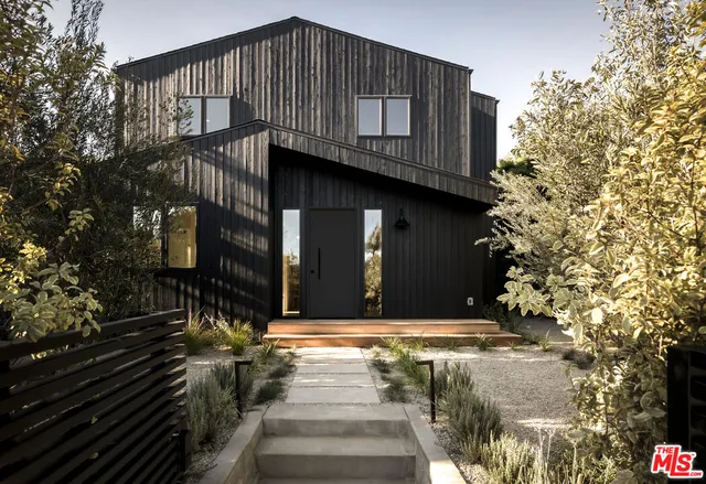 a house view with a outdoor space