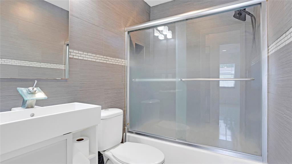 8241 Southwest 3rd Court North Lauderdale, FL 33068 - Photo 13 of 30 a bathroom with a sink toilet and shower