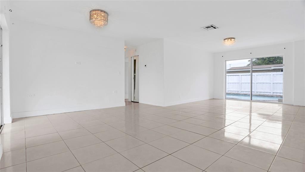 8241 Southwest 3rd Court North Lauderdale, FL 33068 - Photo 22 of 30 an empty room with cabinet and air conditioner