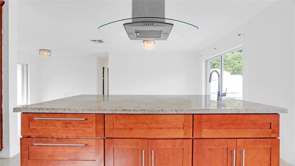 8241 Southwest 3rd Court North Lauderdale, FL 33068 - Photo 5 of 30 a bathroom with a granite countertop sink and a mirror